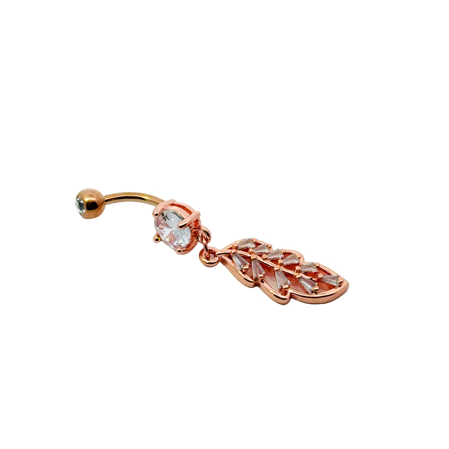 Rose gold belly button bar with feather design on a white background