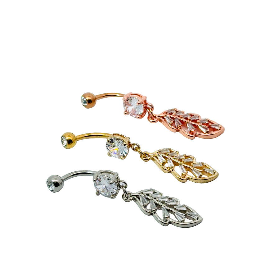Three belly button bars with leaf-shaped pendants on a white background