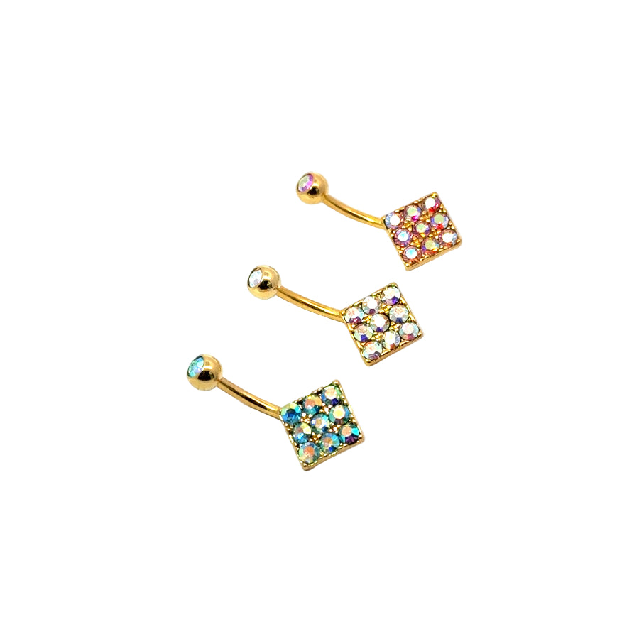 Three gold belly button bars with colorful gemstones on a white background