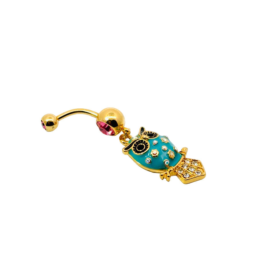 Decorative belly button bar with gold and turquoise owl design on a white background