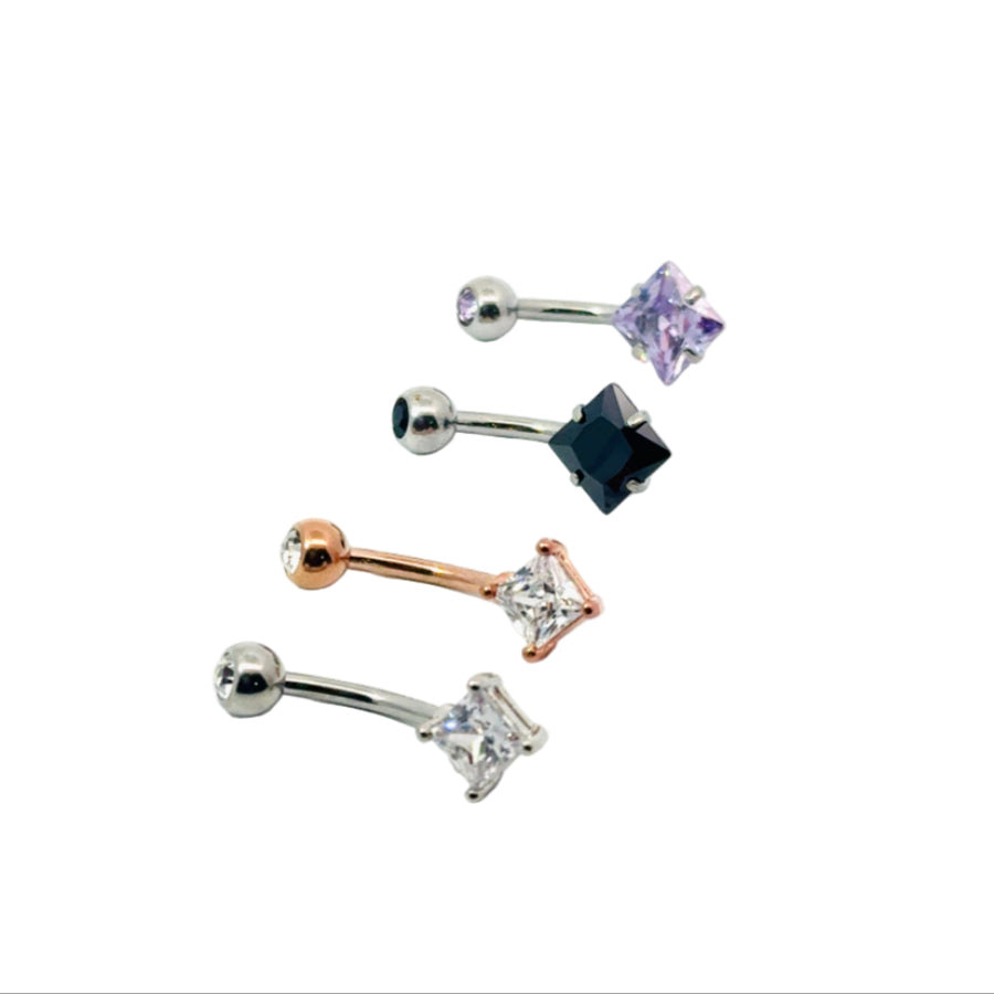 Set of belly button bars with gemstones on a white background
