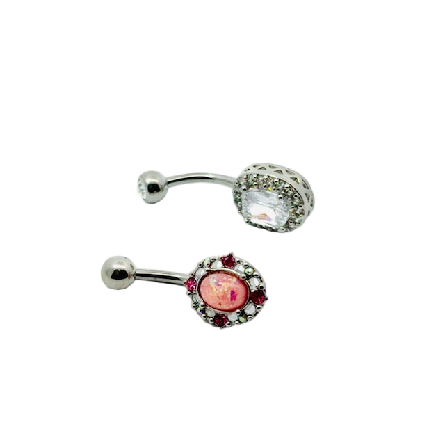 Two belly button bars with gemstone designs on a white background