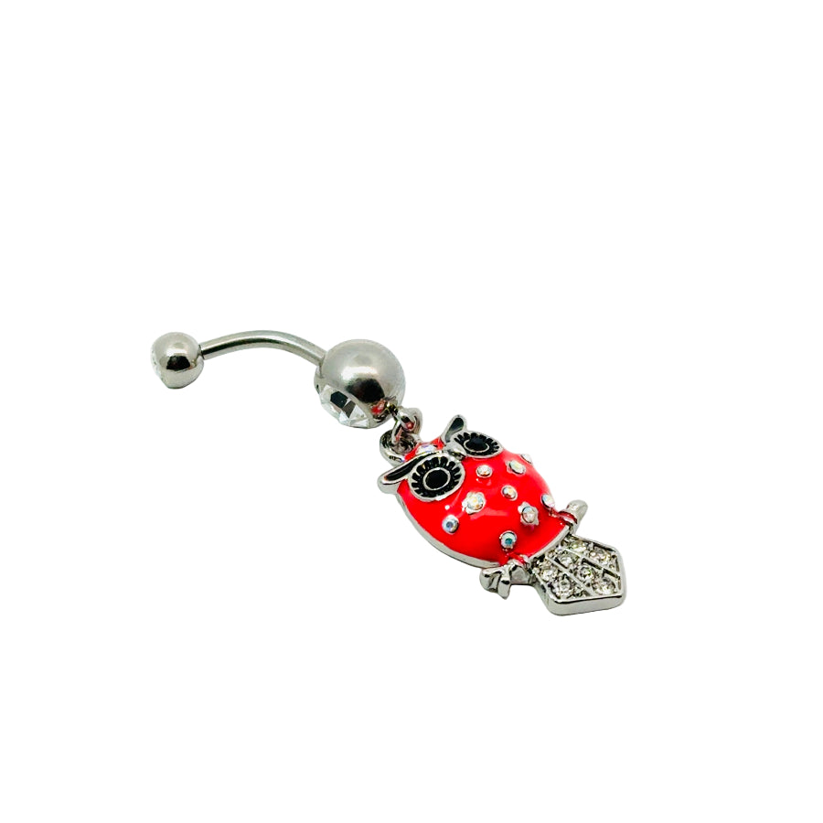 Belly button bar with a red ladybug charm on a white background