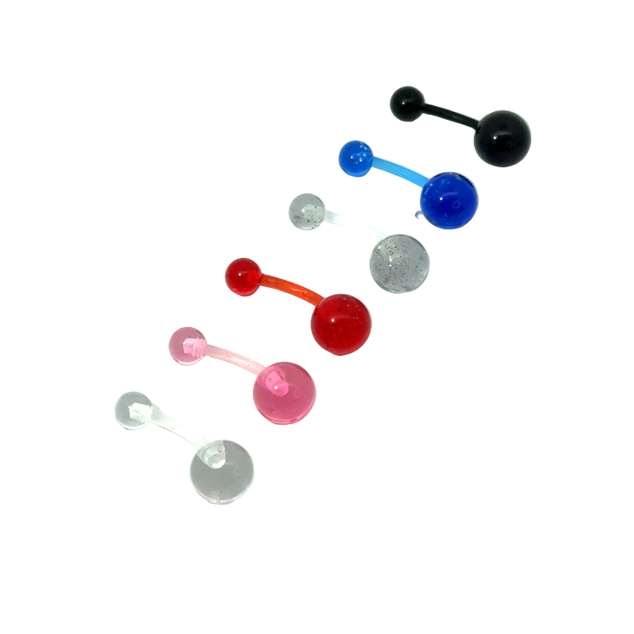 Colorful plastic belly button bars on a white background