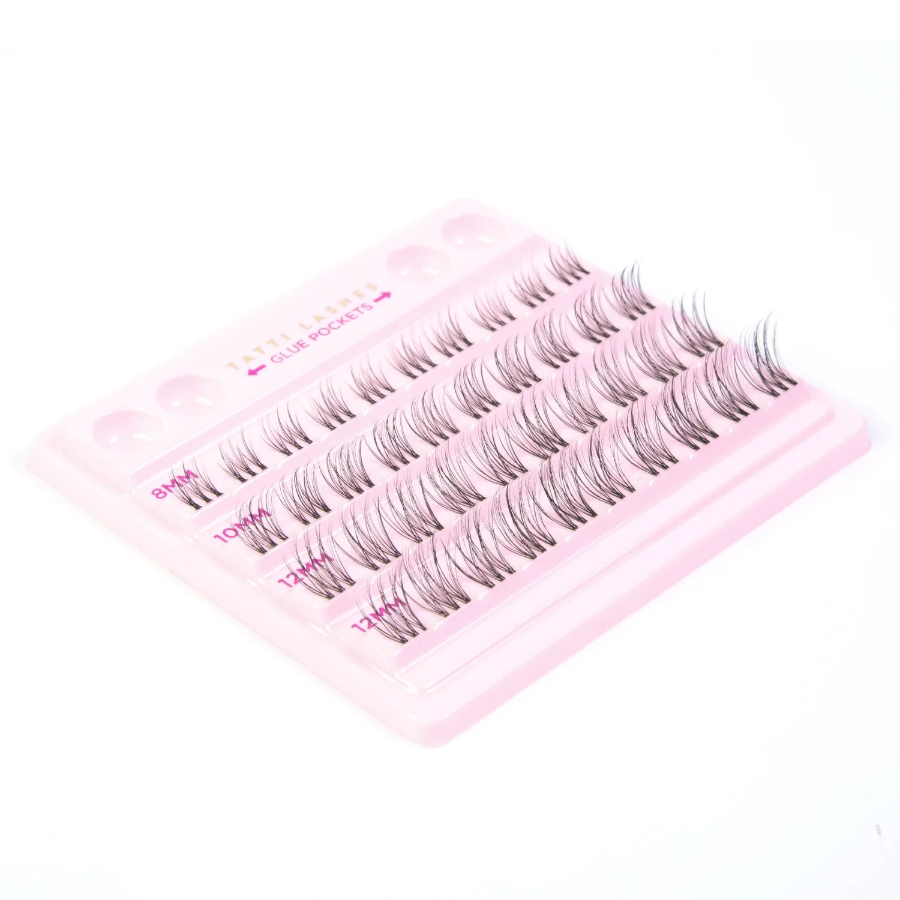 eyelash clusters on a pink base - tatti lash branded