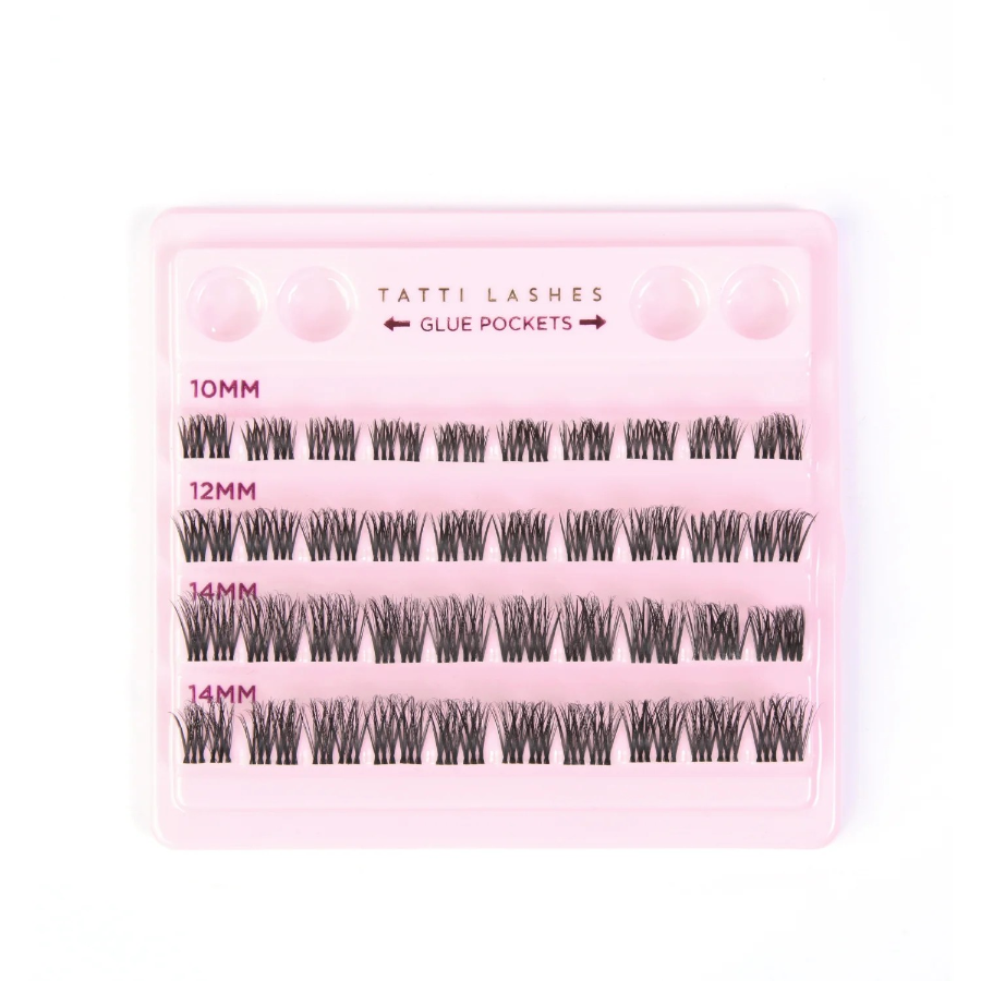 tatti lash branded pink backing tray with rows of eyelash clusters in varying sizes