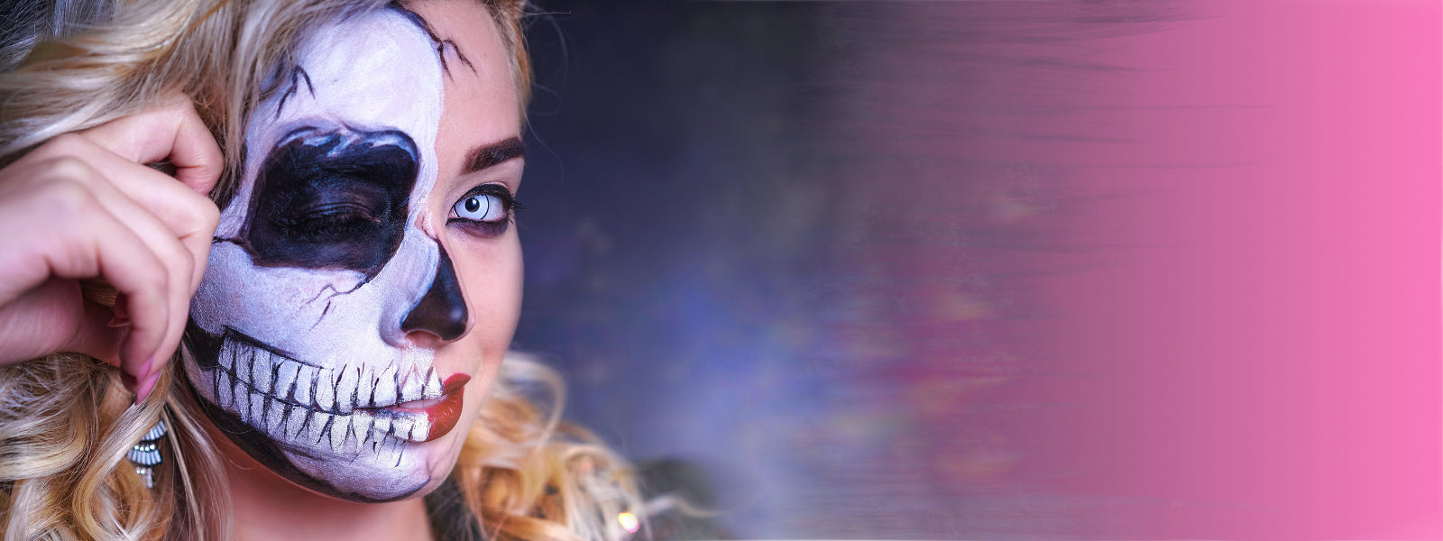 Person with skeleton makeup on a colorful background