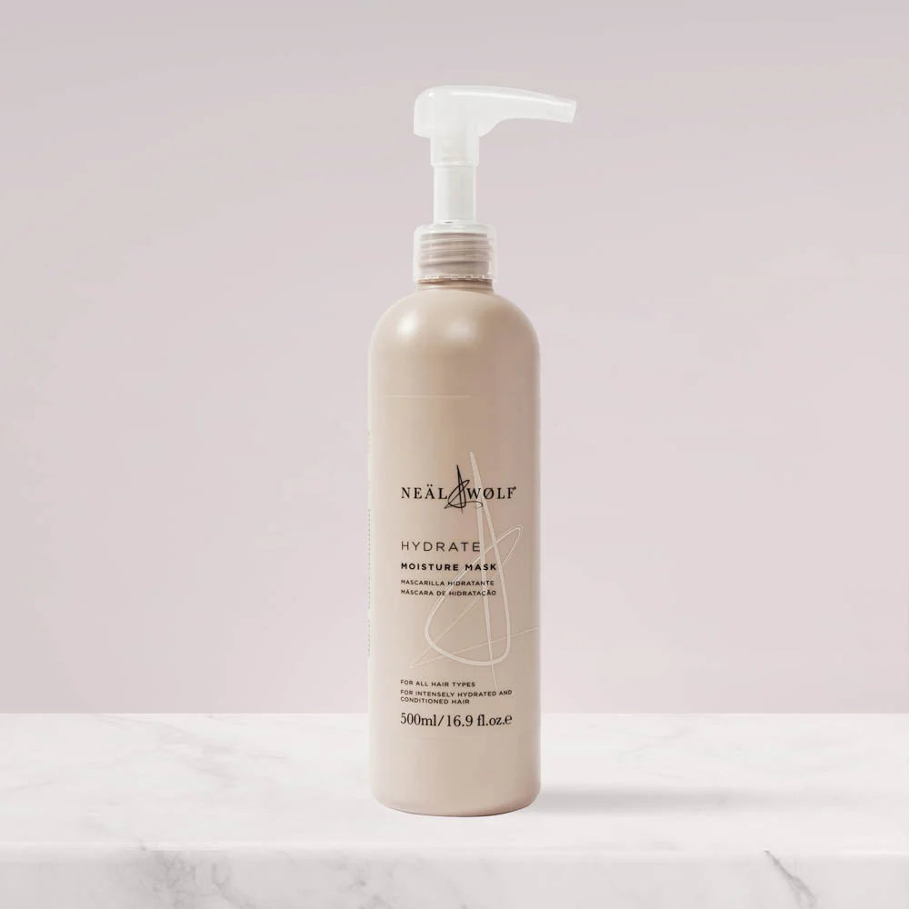Beige bottle with pump of Neal & Wolf Hydrate Moisture Mask on a light pink background