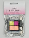 A Claw Culture nail art powder palette with metallic tones, including four colors and two applicators, packaged in a clear plastic bag with pink and silver design elements.