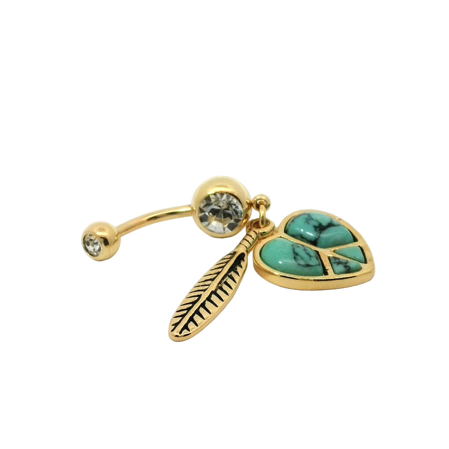 Gold belly button barwith turquoise heart and feather charm on a light background