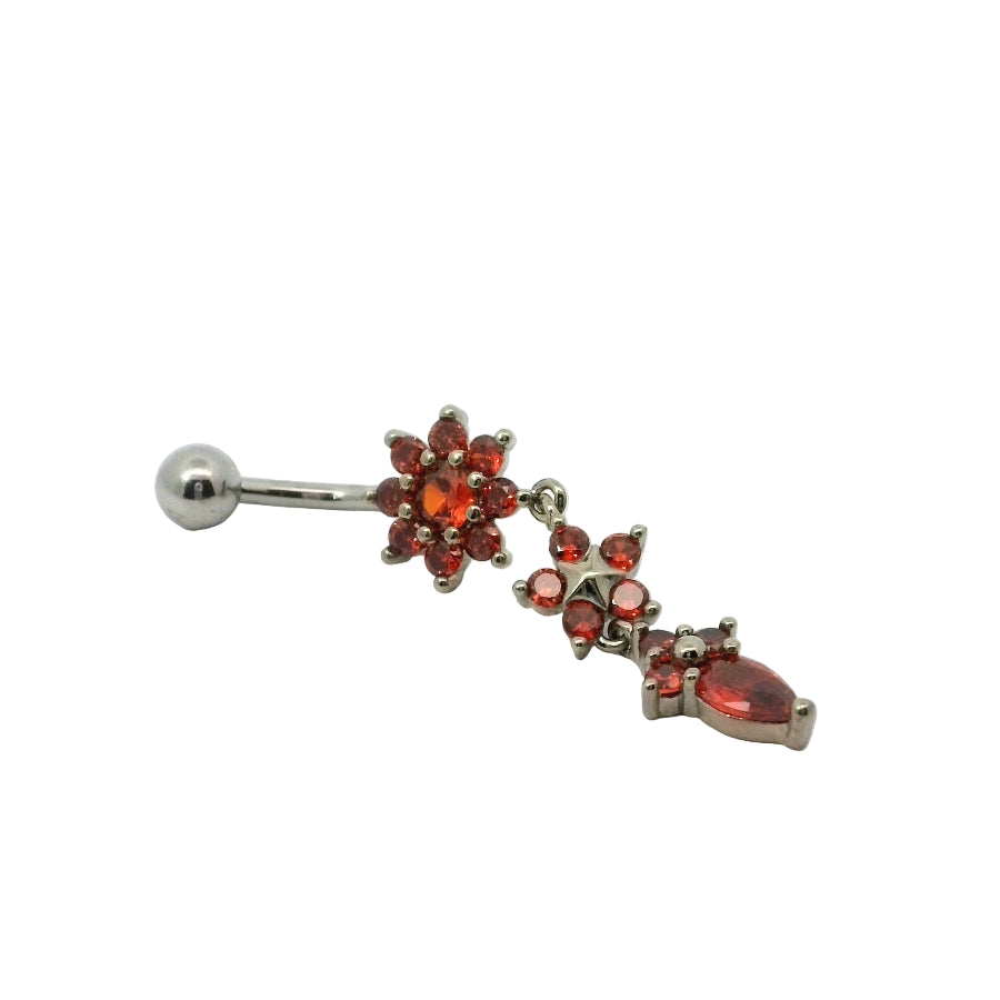 Belly button bar with red gemstones on a white background