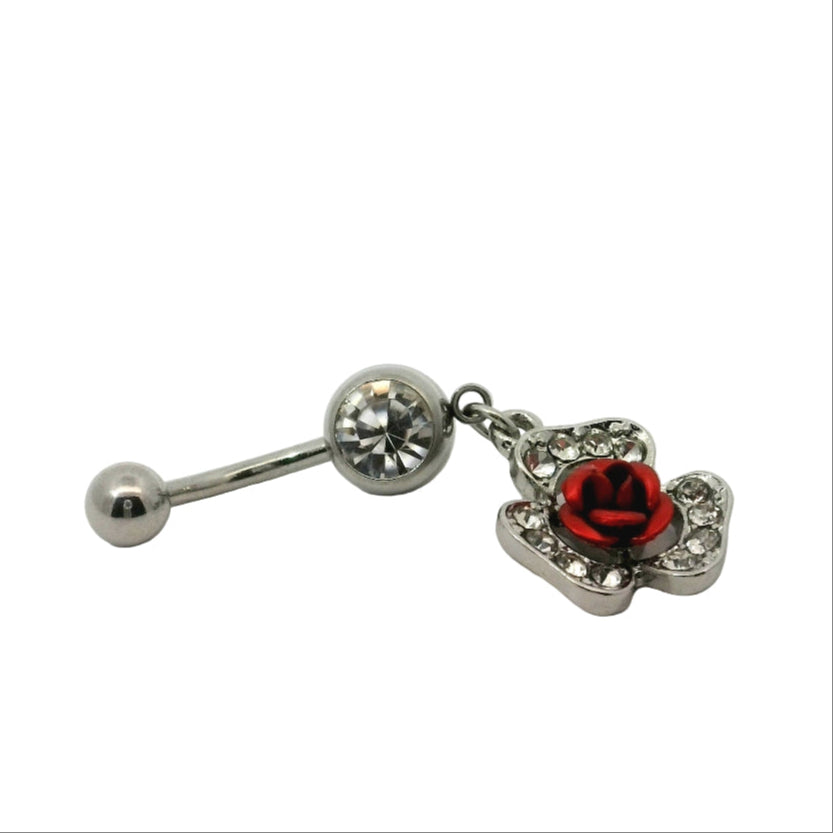 Belly button bar with rose charm on a white background
