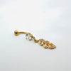 Gold belly button ring with crystal embellishments on a white background