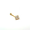 Gold belly button ring with colorful gemstones on a white background