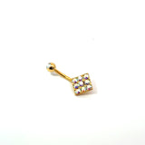 Gold belly button ring with colorful gemstones on a white background