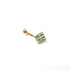 Gold belly button ring with colorful gemstones on a white background