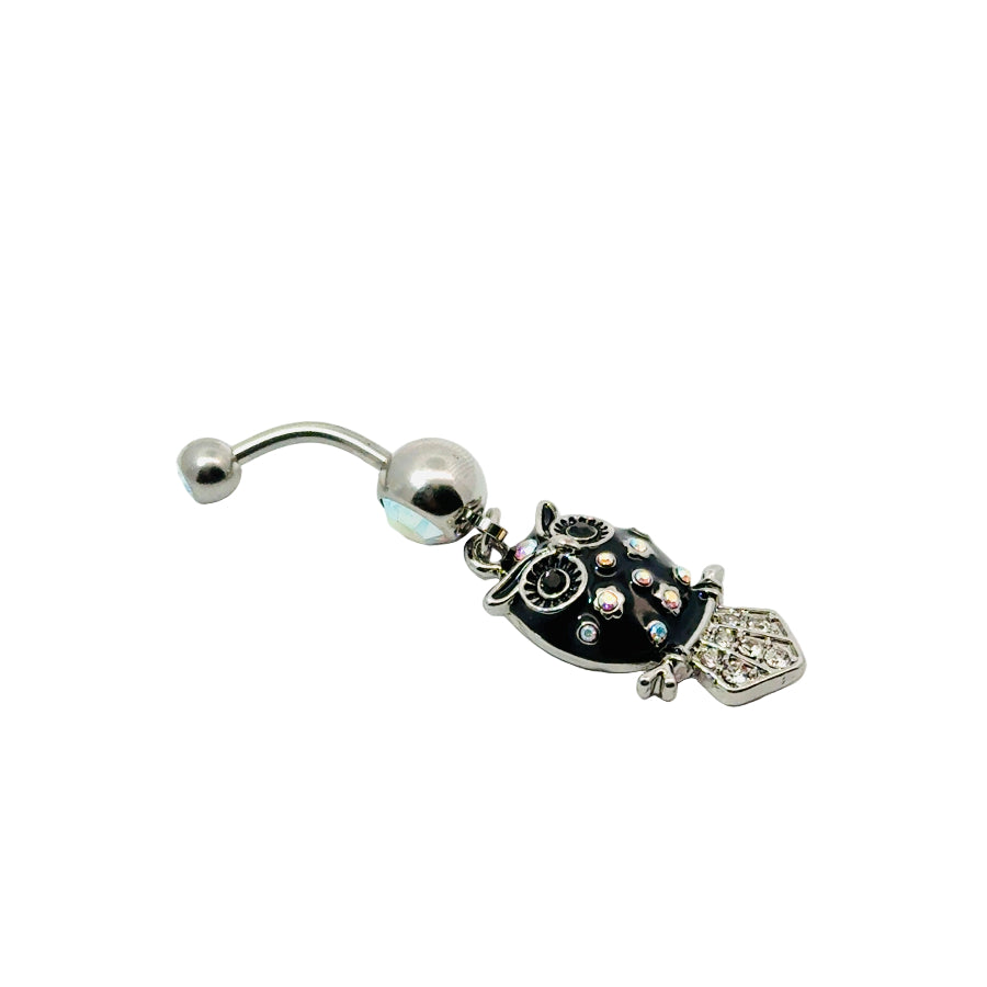 Belly button bar with black owl charm on a white background