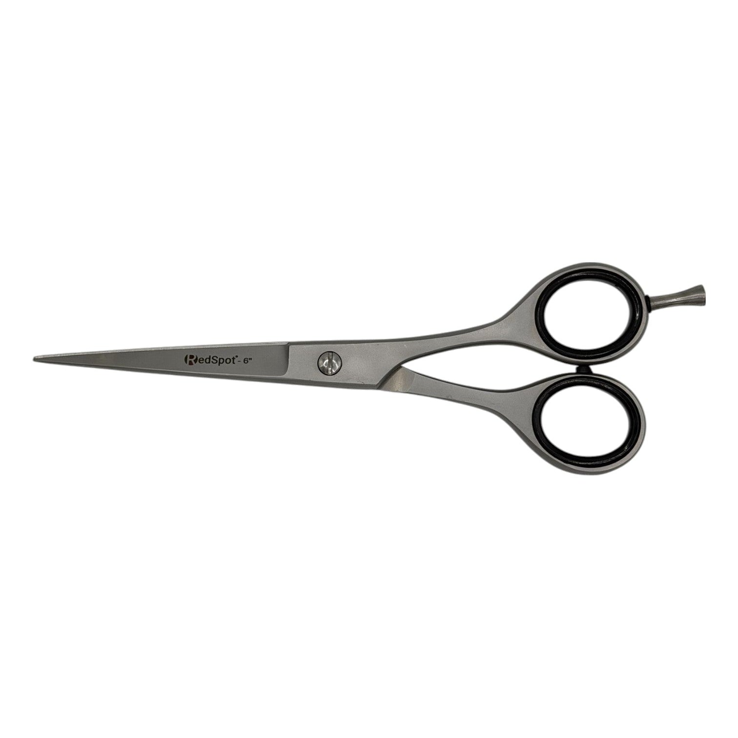 Pair of scissors on a white background