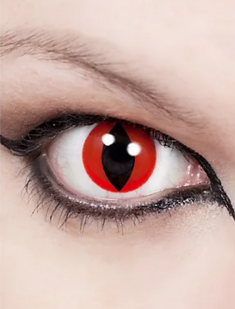 Close-up of a person wearing red, and black contact lenses with a black pupil.