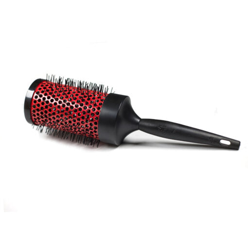 Hairbrush with red bristle head and black handle on a white background