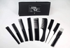 Set of black combs and a black STR pouch on a white background