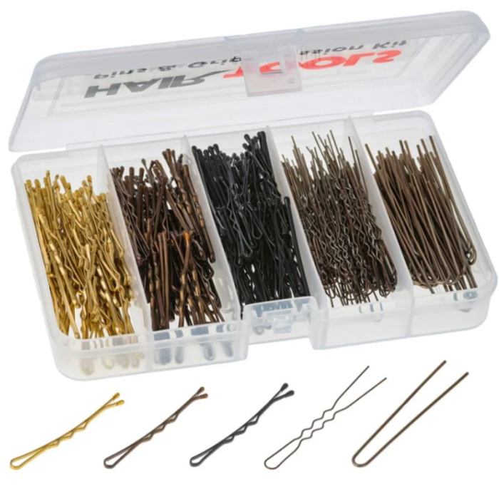 Assorted hair pins in a clear container with visible brand name.