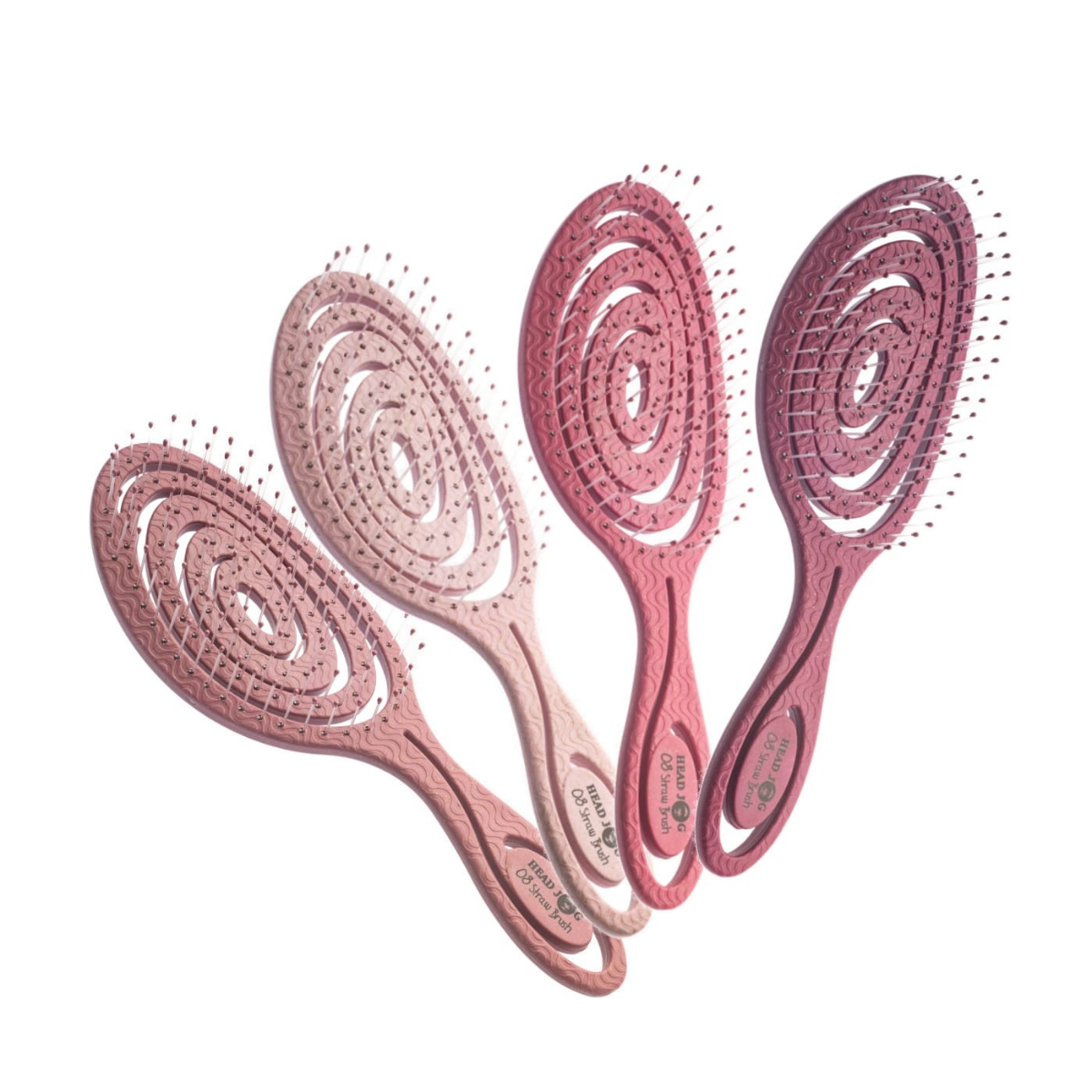 set of 4 pink hairbrushes in various shades of pink on a white background