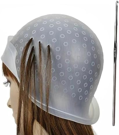 picture of a highlighting capon a head with strands of hair pulled through the holes.