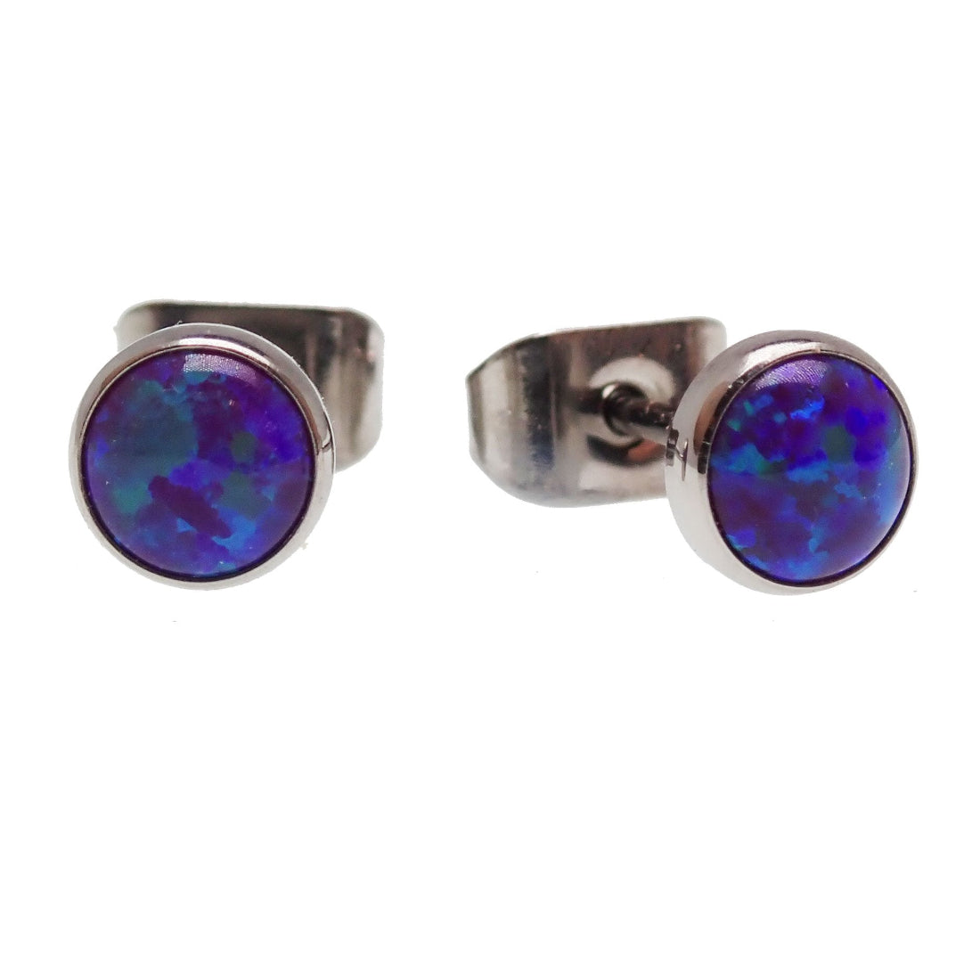 A pair of titanium earrings with bezel-set fire opal stones.